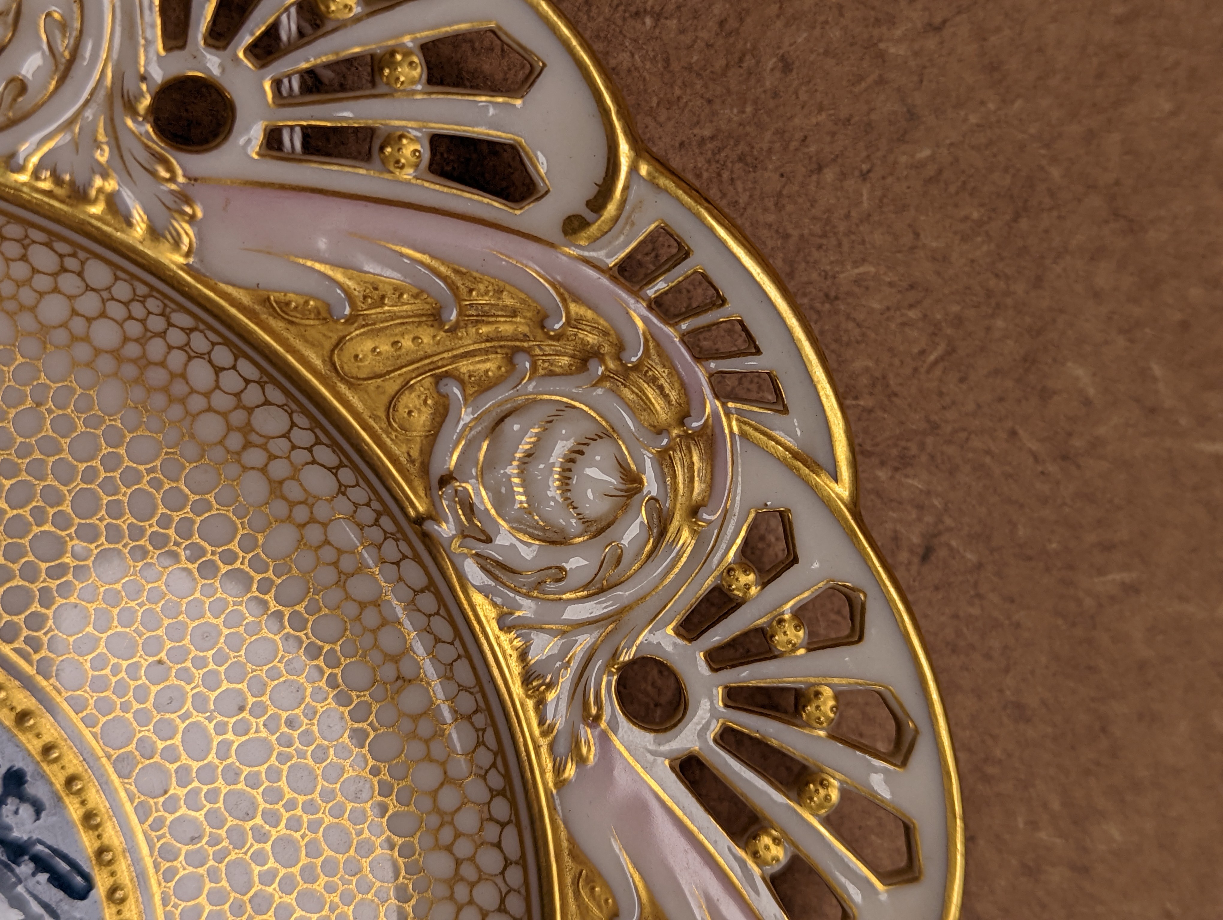 A Mintons pate sur pate cabinet plate, attributed to Alboin Birks, c.1905, diameter 23cm